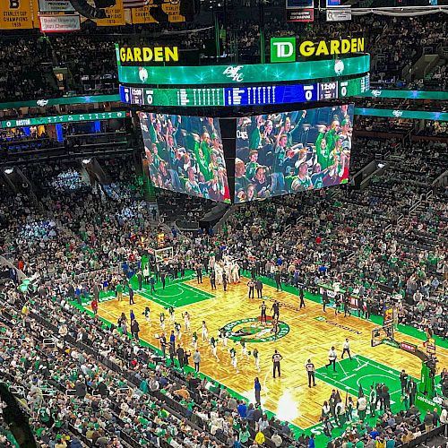 Crowd watching basketball at boston td garden