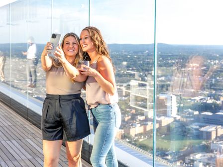 Girls taking a selfie at View Boston